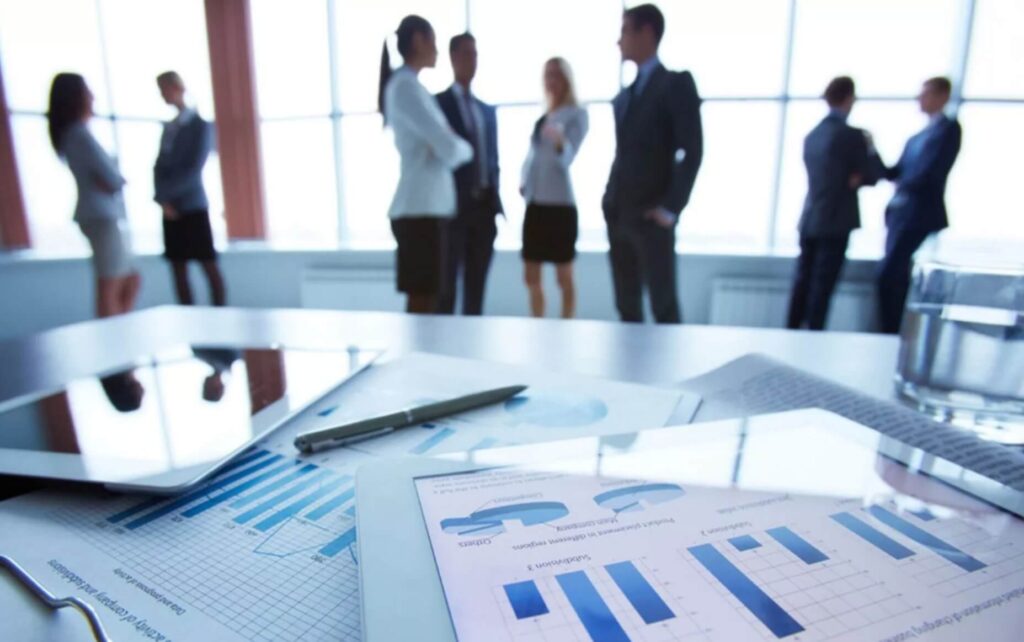 Fundo corporativo da Andrade Soluções Contábeis - Bahia com equipe em reunião